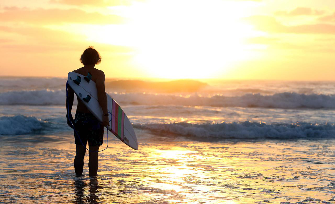 Pondering whether the surf is good enough to risk a shark attack, Lennox Head, 2015
